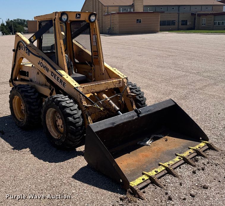 MINI CARGADOR SOBRE RUEDAS 1990 JOHN DEERE 675B