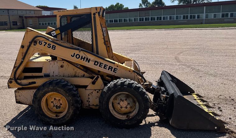 MINI CARGADOR SOBRE RUEDAS 1990 JOHN DEERE 675B