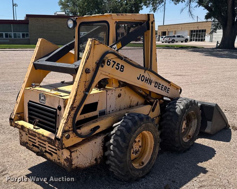 MINI CARGADOR SOBRE RUEDAS 1990 JOHN DEERE 675B
