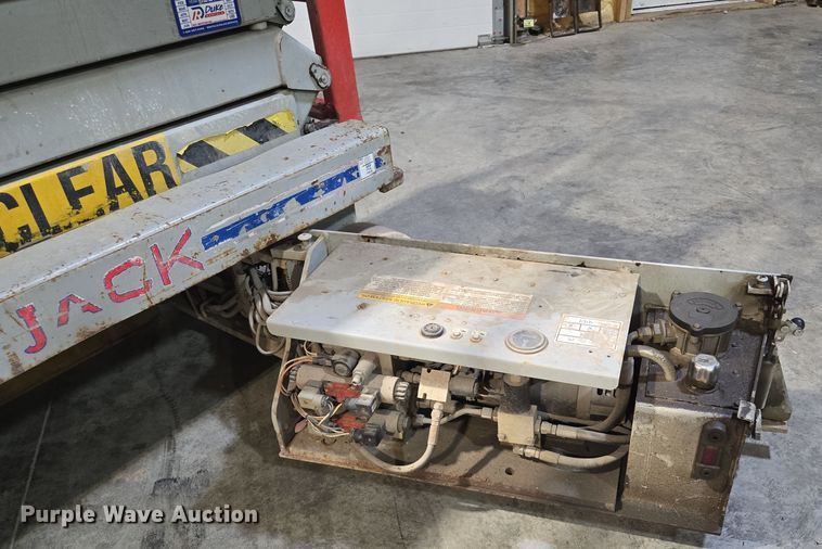 image for item EV1504 2005 SkyJack SJIII 3219 scissor lift