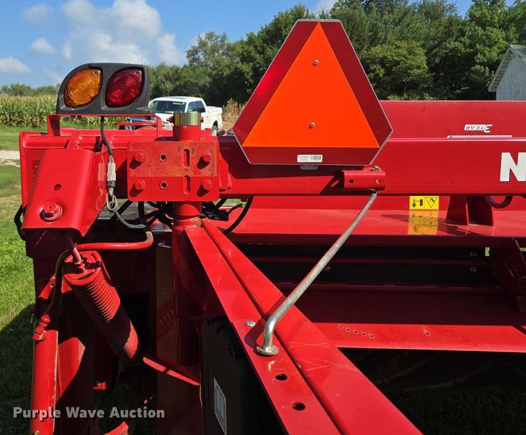 image for item EO1605 2022 New Holland Discbine 210  swather / windrower