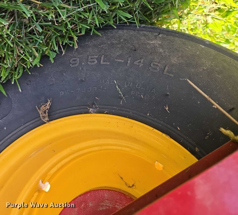 image for item EO1605 2022 New Holland Discbine 210  swather / windrower