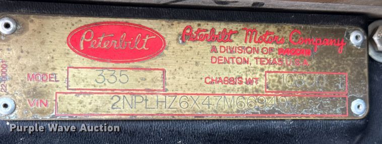 image for item ED5851 2007 Peterbilt 335 flatbed truck