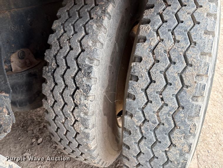 image for item EM0581 2004 Mack CX613 flatbed truck