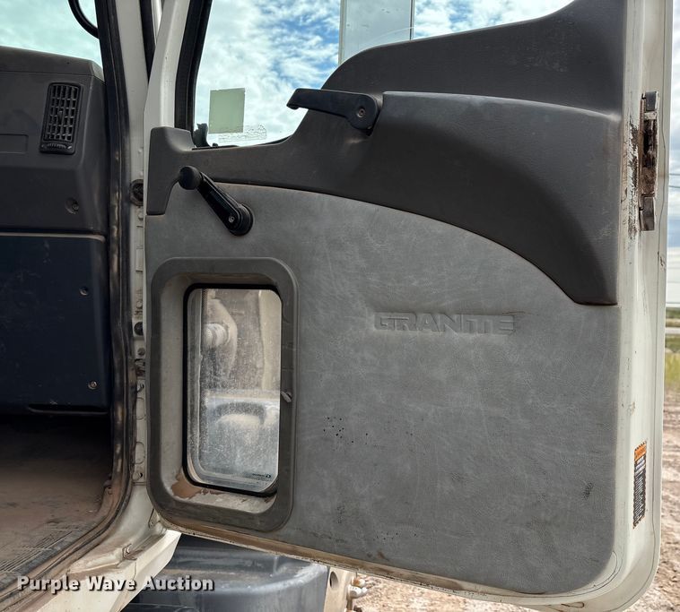 image for item EM0583 2008 Mack GU713 flatbed truck