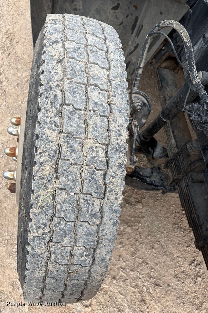 image for item EM0583 2008 Mack GU713 flatbed truck