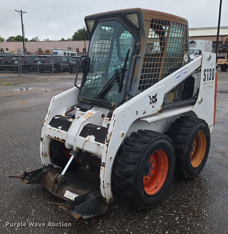 MINI CARGADOR SOBRE RUEDAS 2004 BOBCAT S130