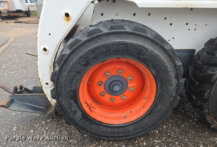 image for item EN8390 2004 Bobcat S130 skid steer loader