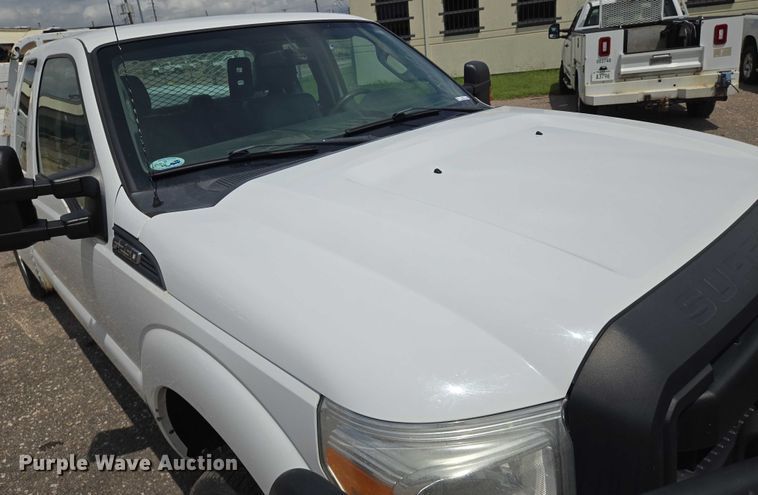 image for item EN8417 2014 Ford F250 Super Duty SuperCab utility bed pickup truck