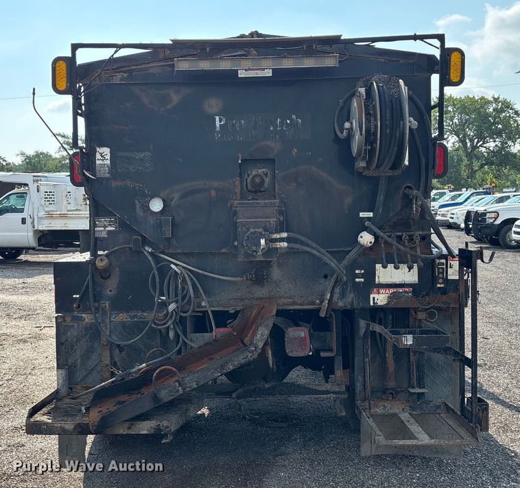 image for item EN8443 2012 Freightliner Business Class M2 pothole patcher truck