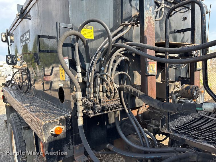 image for item EN8443 2012 Freightliner Business Class M2 pothole patcher truck