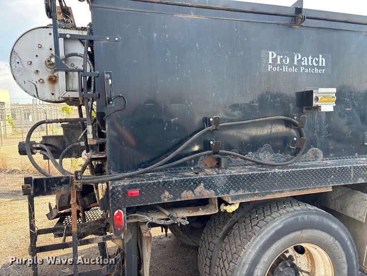 image for item EN8443 2012 Freightliner Business Class M2 pothole patcher truck