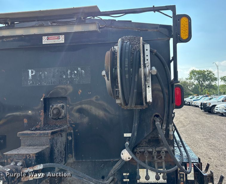 image for item EN8443 2012 Freightliner Business Class M2 pothole patcher truck