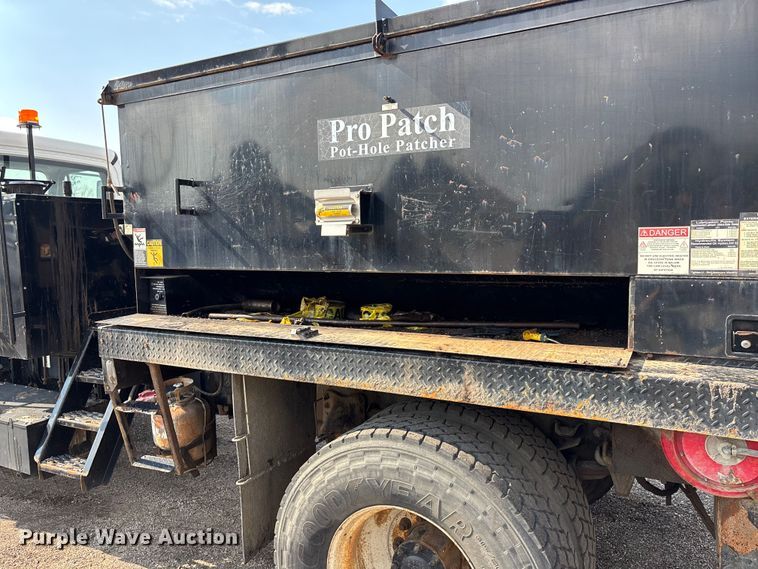 image for item EN8443 2012 Freightliner Business Class M2 pothole patcher truck