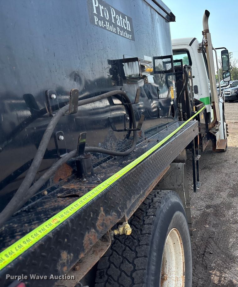 image for item EN8443 2012 Freightliner Business Class M2 pothole patcher truck