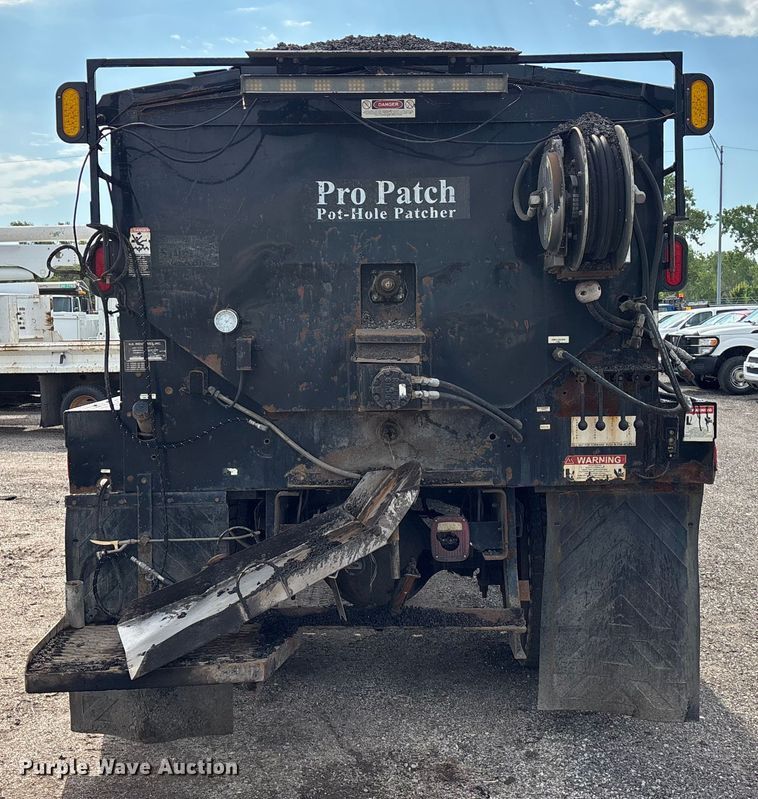 image for item EN8444 2012 Freightliner Business Class M2 pothole patcher truck