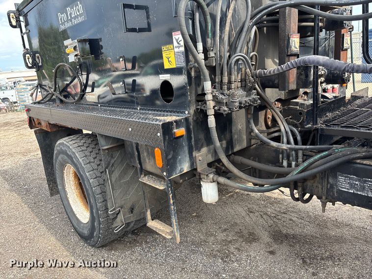 image for item EN8444 2012 Freightliner Business Class M2 pothole patcher truck