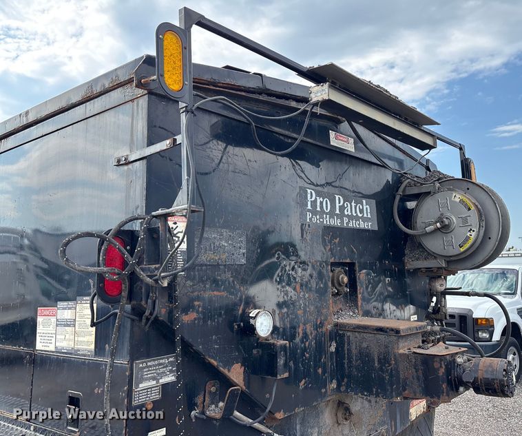 image for item EN8444 2012 Freightliner Business Class M2 pothole patcher truck