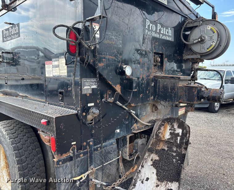 image for item EN8444 2012 Freightliner Business Class M2 pothole patcher truck