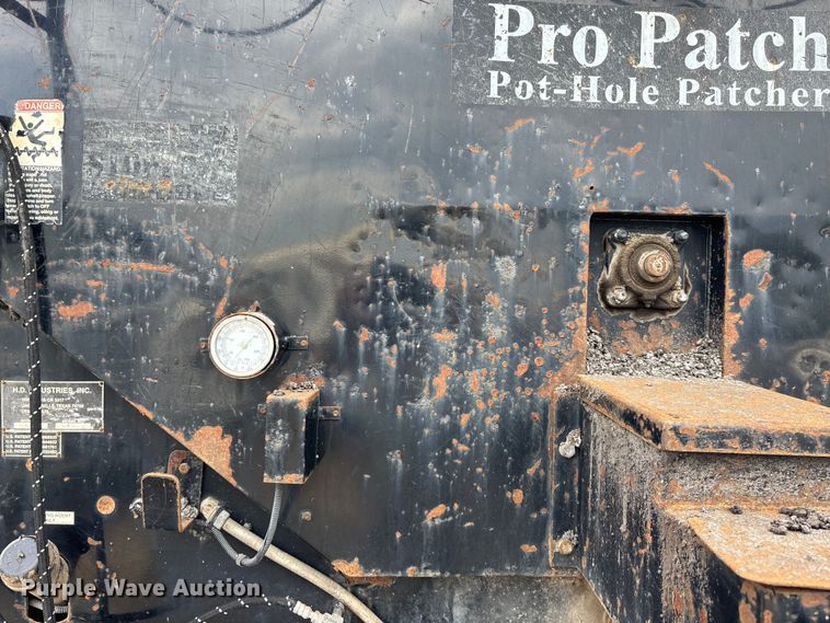 image for item EN8444 2012 Freightliner Business Class M2 pothole patcher truck