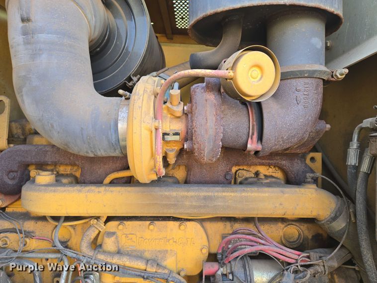 image for item EN8473 2000 John Deere 772CH motor grader