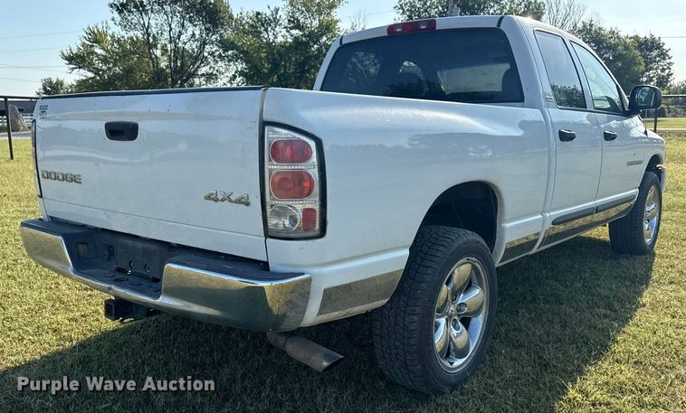 image for item DJ7765 2002 Dodge Ram 1500 Quad Cab pickup truck