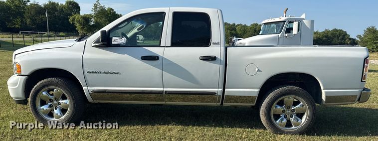 image for item DJ7765 2002 Dodge Ram 1500 Quad Cab pickup truck