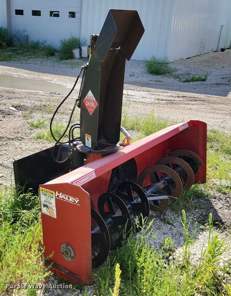 image for item DX7423 New Holland Red Devel skid steer snow blower