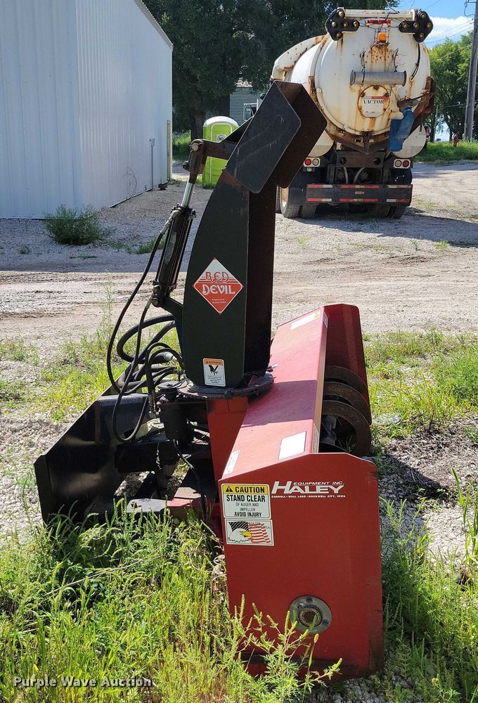 image for item DX7423 New Holland Red Devel skid steer snow blower