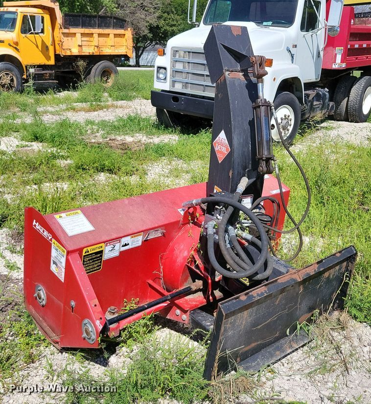 image for item DX7423 New Holland Red Devel skid steer snow blower