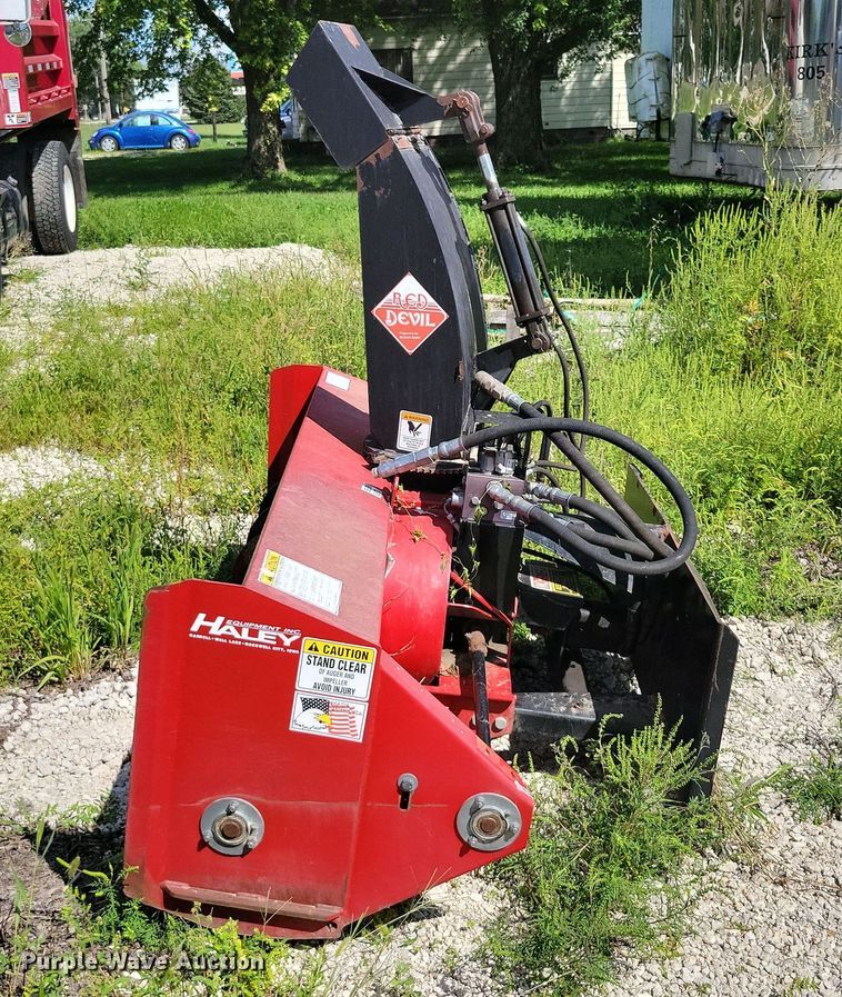 image for item DX7423 New Holland Red Devel skid steer snow blower