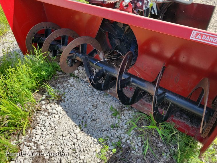 image for item DX7423 New Holland Red Devel skid steer snow blower