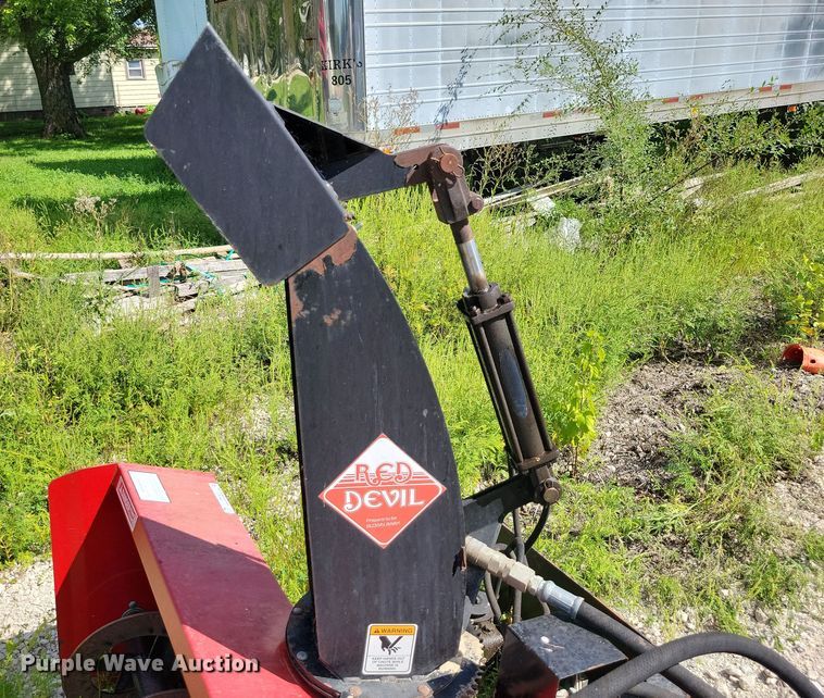 image for item DX7423 New Holland Red Devel skid steer snow blower