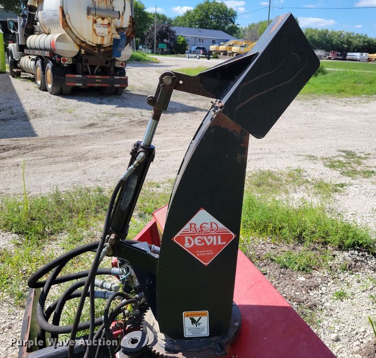 image for item DX7423 New Holland Red Devel skid steer snow blower