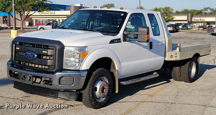 image for item DZ6482 2013 Ford F350 Super Duty SuperCab flatbed pickup truck
