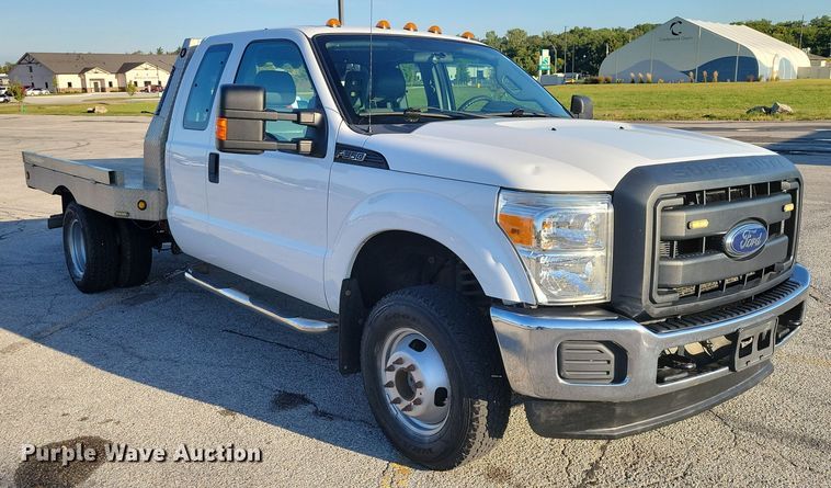 image for item DZ6482 2013 Ford F350 Super Duty SuperCab flatbed pickup truck