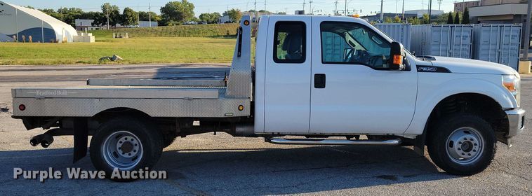 image for item DZ6482 2013 Ford F350 Super Duty SuperCab flatbed pickup truck