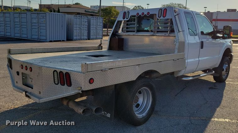 image for item DZ6482 2013 Ford F350 Super Duty SuperCab flatbed pickup truck