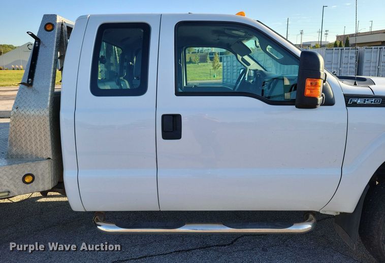 image for item DZ6482 2013 Ford F350 Super Duty SuperCab flatbed pickup truck