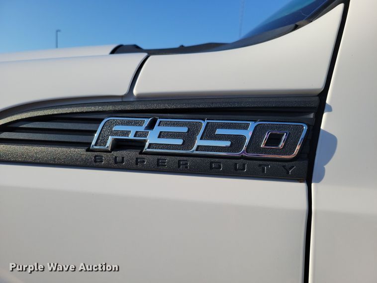 image for item DZ6482 2013 Ford F350 Super Duty SuperCab flatbed pickup truck