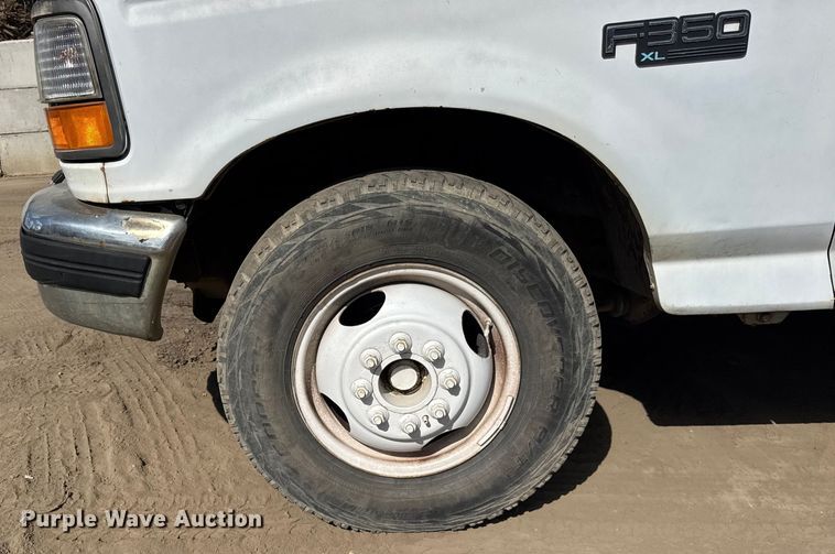 image for item ER0002 1995 Ford F350 Crew Cab dump bed pickup truck