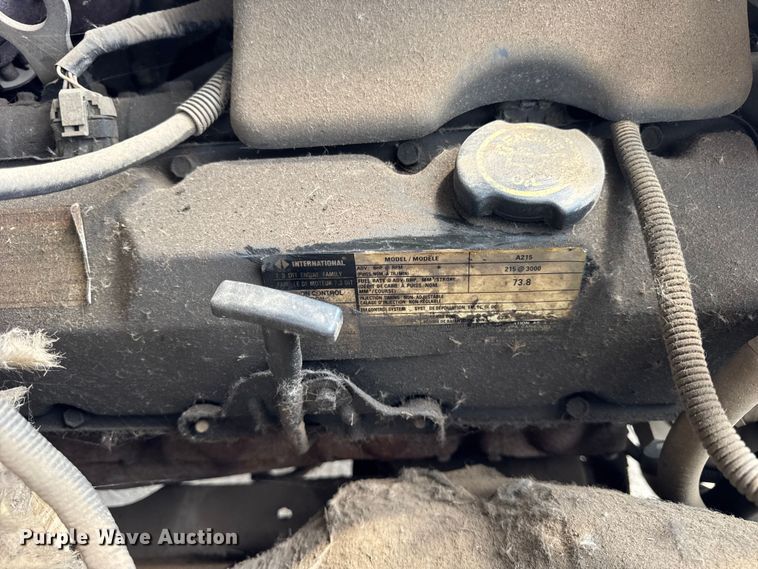 image for item ER0008 1995 Ford F350 Crew Cab dump bed pickup truck