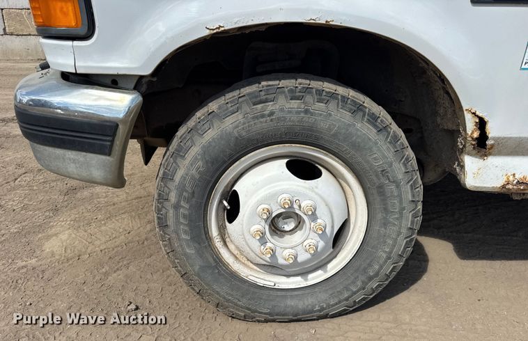 image for item ER0009 1995 Ford F350 Crew Cab dump bed pickup truck