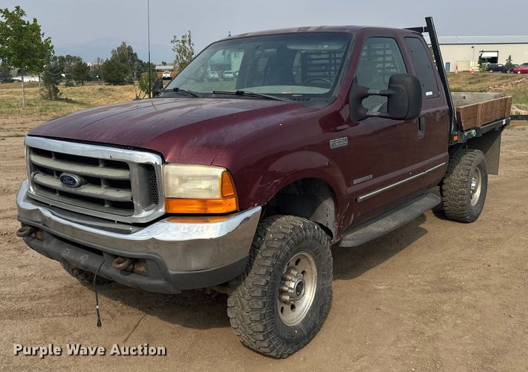 image for item ER2260 2000 Ford F250 Super Duty SuperCab flatbed pickup truck