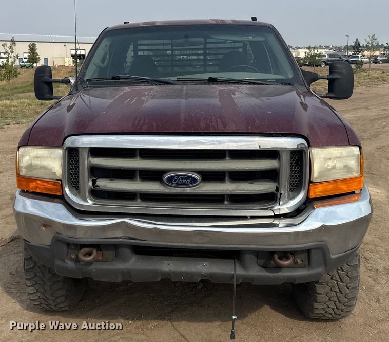 image for item ER2260 2000 Ford F250 Super Duty SuperCab flatbed pickup truck