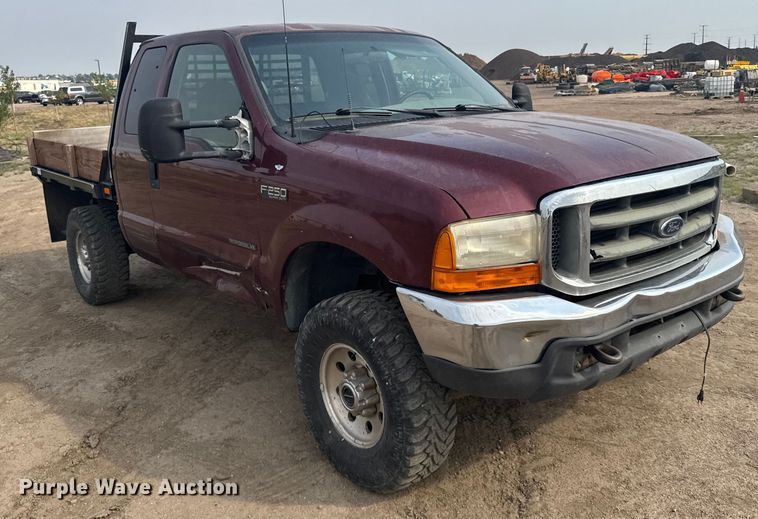 image for item ER2260 2000 Ford F250 Super Duty SuperCab flatbed pickup truck