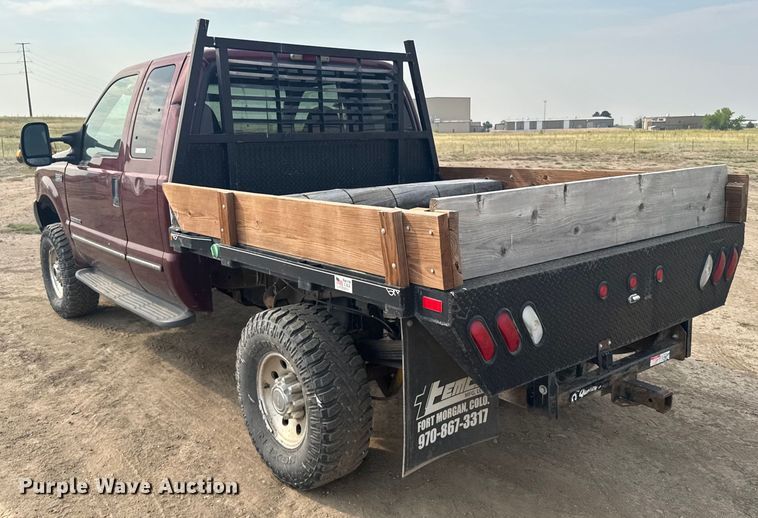 image for item ER2260 2000 Ford F250 Super Duty SuperCab flatbed pickup truck