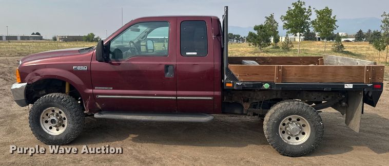 image for item ER2260 2000 Ford F250 Super Duty SuperCab flatbed pickup truck