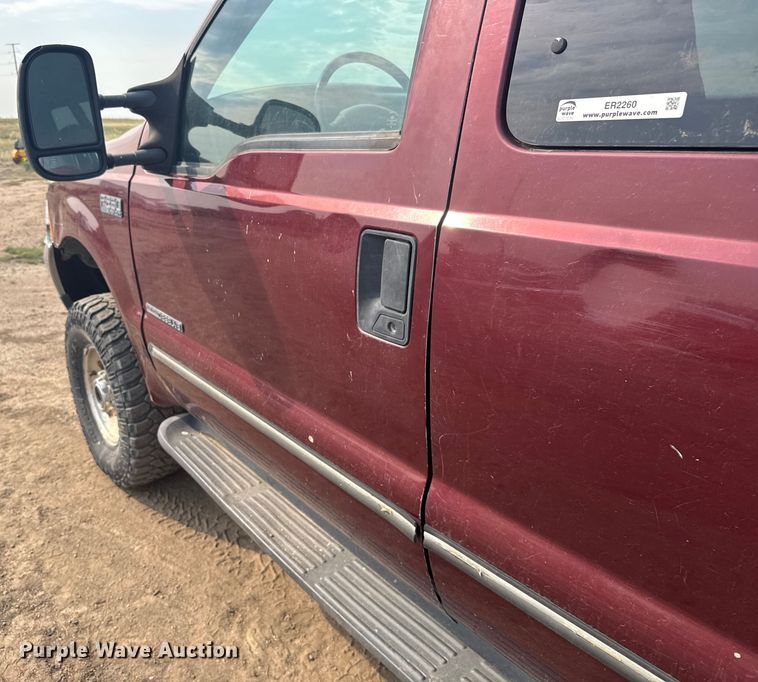 image for item ER2260 2000 Ford F250 Super Duty SuperCab flatbed pickup truck