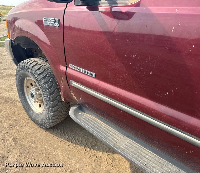 image for item ER2260 2000 Ford F250 Super Duty SuperCab flatbed pickup truck